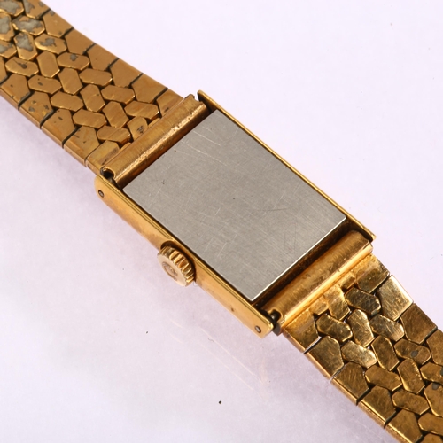 1028 - OMEGA - a lady's gold plated stainless steel De Ville mechanical bracelet watch, ref. 511.0459, circ... 