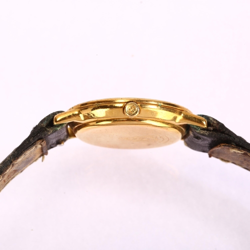 1029 - GUCCI - a lady's gold plated 3001L quartz wristwatch, circa 1986, black dial with Roman numeral beze... 