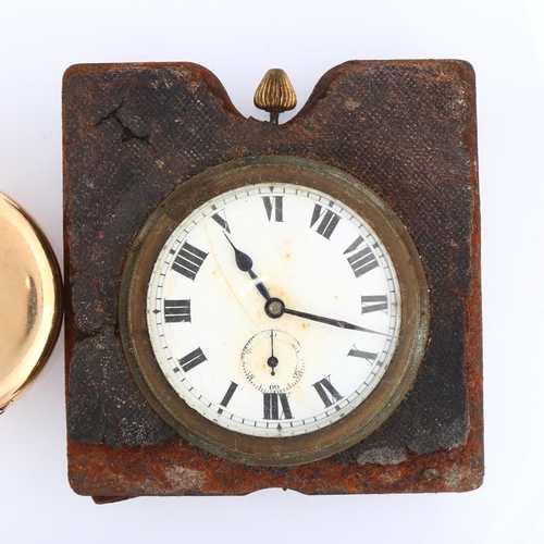 1061 - An early 20th century gold plated half hunter keyless pocket watch, and a leather-cased travelling c... 