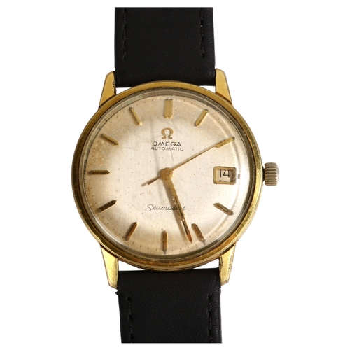 1075 - OMEGA - a gold plated stainless steel Seamaster automatic wristwatch, silvered dial with applied gil... 