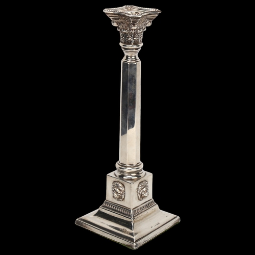 1403 - George V silver table candlestick, with hexagonal column and lion mask mounted base, London 1929, in... 