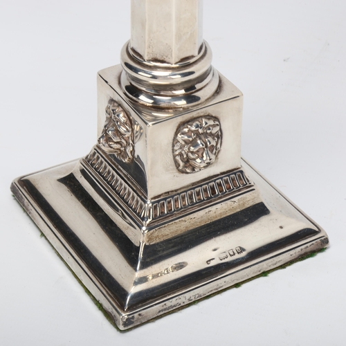 1403 - George V silver table candlestick, with hexagonal column and lion mask mounted base, London 1929, in... 