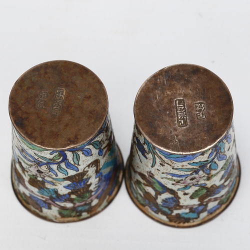 1414 - A pair of small Chinese silver and enamel drinking tots, with bird and blossom designs, impressed ma... 