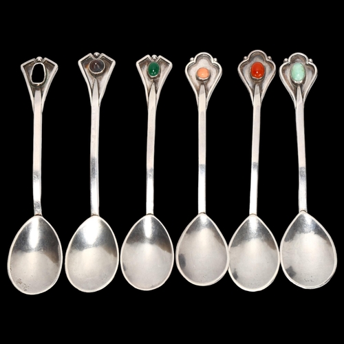 1415 - A set of Arts and Crafts unmarked white metal spoons, with gemstone set handles, Guild Of Handicraft... 