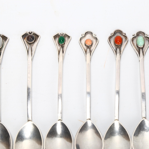 1415 - A set of Arts and Crafts unmarked white metal spoons, with gemstone set handles, Guild Of Handicraft... 