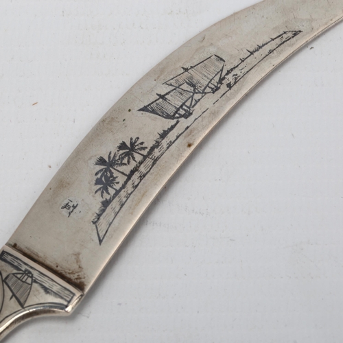 1417 - An Iraqi sterling silver and niello saber design paper knife, length 15cm