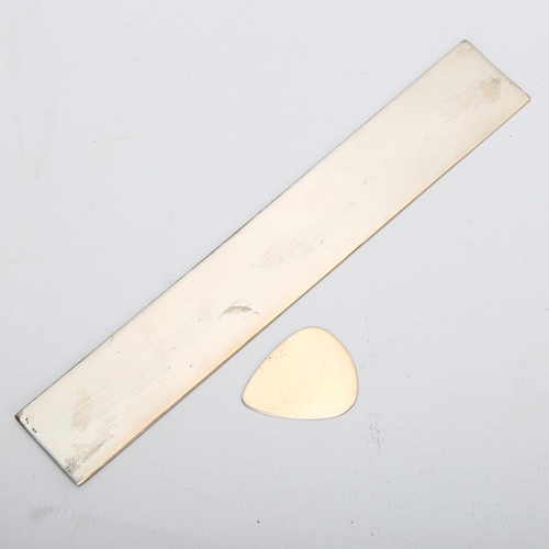 1428 - A modern silver ruler, length 16cm, and a modern silver guitar pick