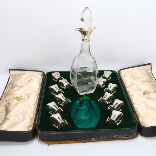 1433 - An Edwardian silver-mounted decanter and Mether cup liqueur set, the square cut-glass decanter havin... 