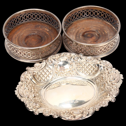 1443 - Elizabeth II oval silver bon bon dish with embossed decoration, London 1970, length 15.5cm, and a pa... 