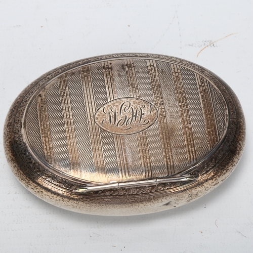 1447 - George V oval silver tobacco box, engine turned decoration, Chester 1924, 2.8oz, length 10cm