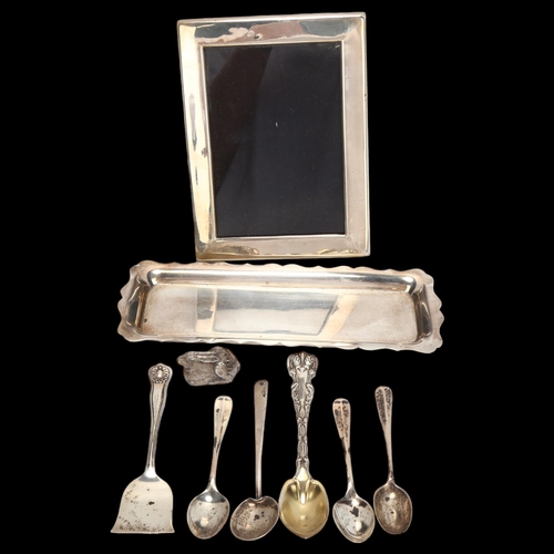 1456 - A rectangular silver photo frame, Birmingham 1992, 16cm x 12cm, a silver dressing table tray, Sheffi... 