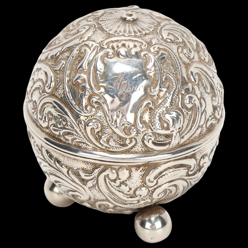 1462 - Victorian silver ball-shaped string box, relief embossed decoration, William Comyns, London 1892, he... 