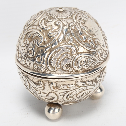 1462 - Victorian silver ball-shaped string box, relief embossed decoration, William Comyns, London 1892, he... 