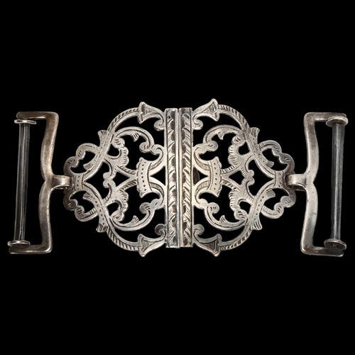 1464 - An Edwardian pierced and engraved silver nurse's buckle, Birmingham 1908, height 5cm