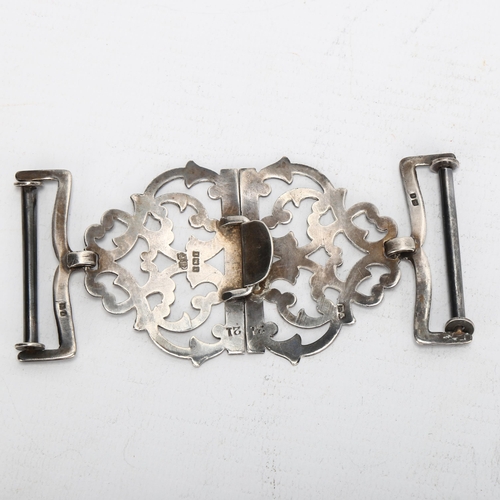 1464 - An Edwardian pierced and engraved silver nurse's buckle, Birmingham 1908, height 5cm