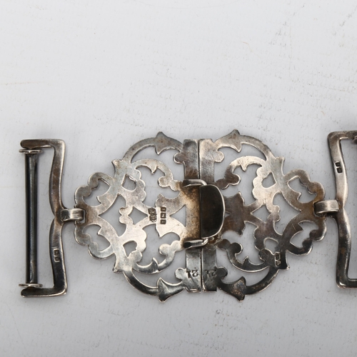 1464 - An Edwardian pierced and engraved silver nurse's buckle, Birmingham 1908, height 5cm