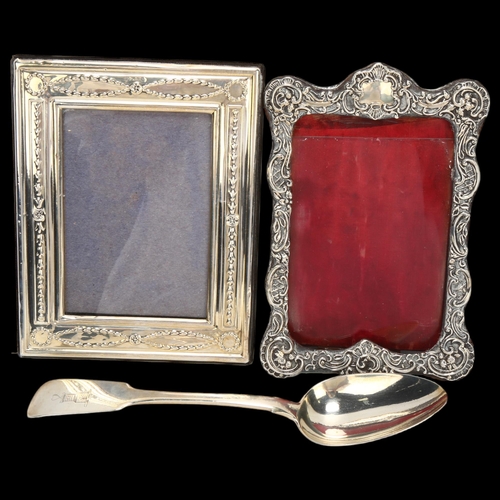 1466 - An embossed silver-fronted photo frame, circa 1900, height 18cm, indistinct hallmarks, a modern rect... 