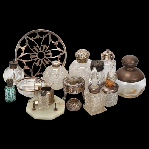 1471 - A group of silver-topped jars and bottles, a silver and glass teapot stand etc