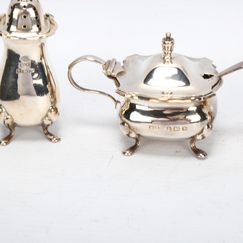 1473 - A cased  3-piece silver cruet set, blue glass liners and original spoons, Walker & Hall