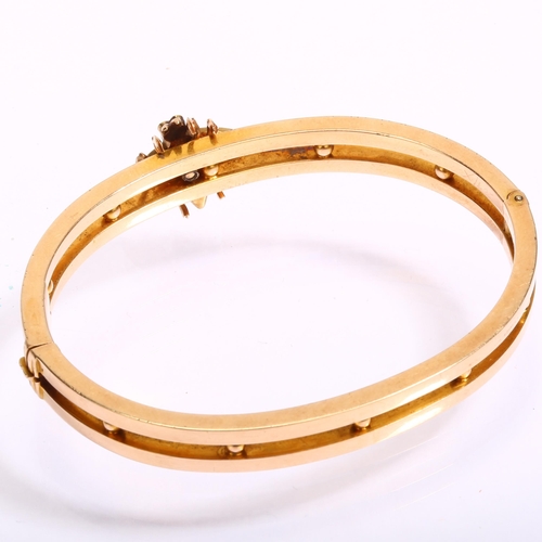 1101 - A Victorian figural bee bug hinged bangle, circa 1900, apparently unmarked, set with cats eye chryso... 