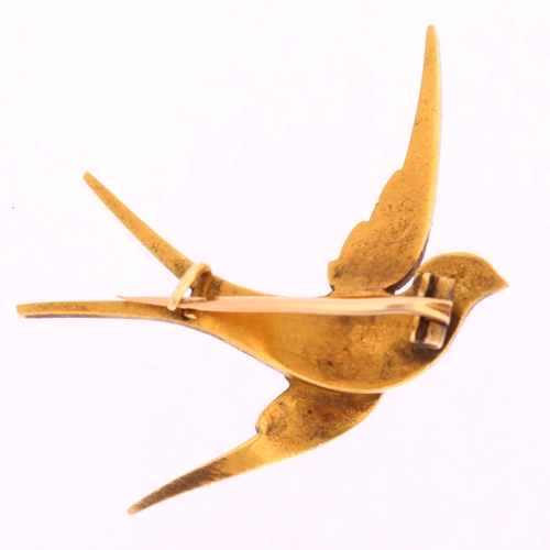 1103 - An Edwardian pearl and ruby swallow bird brooch, circa 1905, unmarked gold settings, wingspan 41.3mm... 