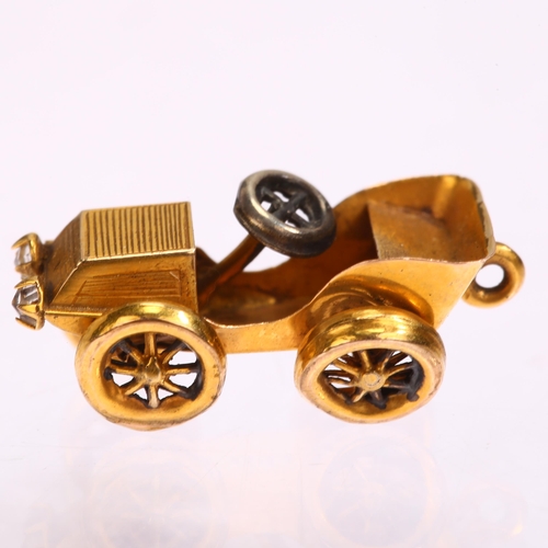 1104 - An early 20th century 9ct gold Classic car charm/pendant, length 21.8mm, 1.5g