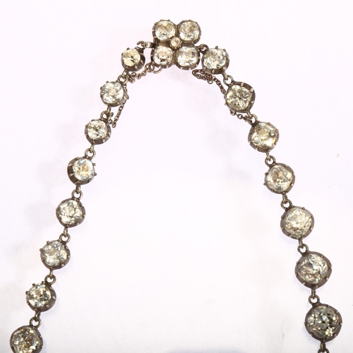 1106 - A Georgian silver and gold backed paste Riviere necklace, the foil-backed paste in cut-down collet s... 