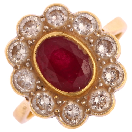 1116 - An 18ct gold ruby and diamond oval cluster ring, set with oval mixed-cut ruby and modern round brill... 