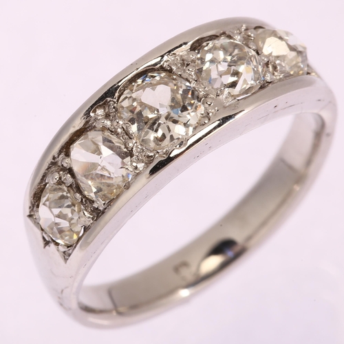 1123 - A graduated five stone diamond half hoop ring, unmarked white metal settings with old-cut diamonds, ... 