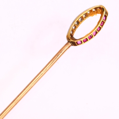 1124 - An Art Deco ruby and diamond ellipse? stickpin, unmarked gold settings with calibre-cut rubies and r... 