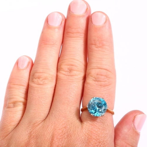 1128 - An early 20th century 18ct gold solitaire blue zircon ring, set with 6.4ct round brilliant-cut zirco... 