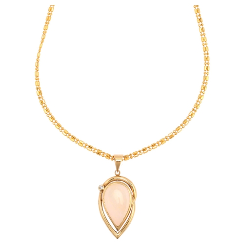 1129 - A 14ct gold opal and diamond pear-drop pendant necklace, on 22ct fancy link chain, set with pear cab... 