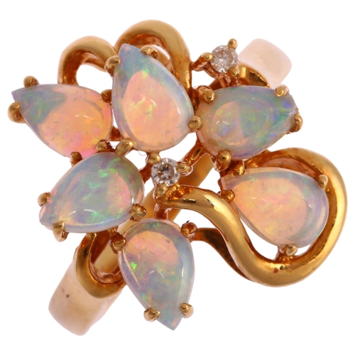 1130 - An 18ct gold opal and diamond openwork cocktail ring, set with pear cabochon opal and modern round b... 