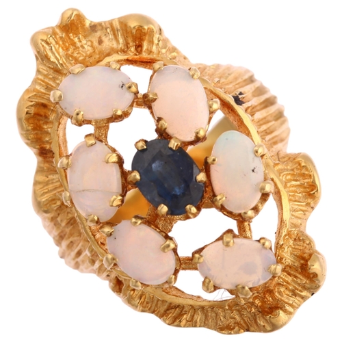 1134 - A late 20th century sapphire and opal openwork cluster ring, unmarked gold textured settings, with o... 