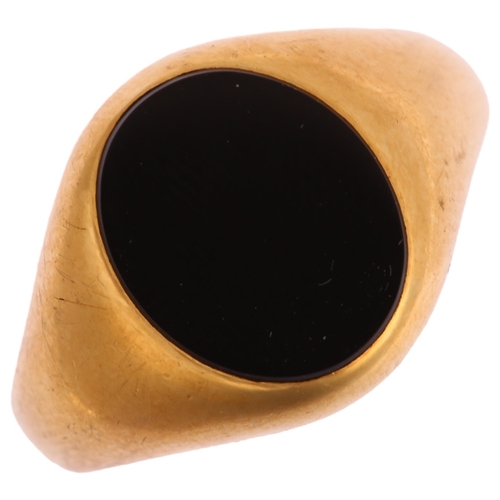 1136 - A mid-20th century 18ct gold black onyx signet ring, indistinct maker's mark, Birmingham 1968, setti... 