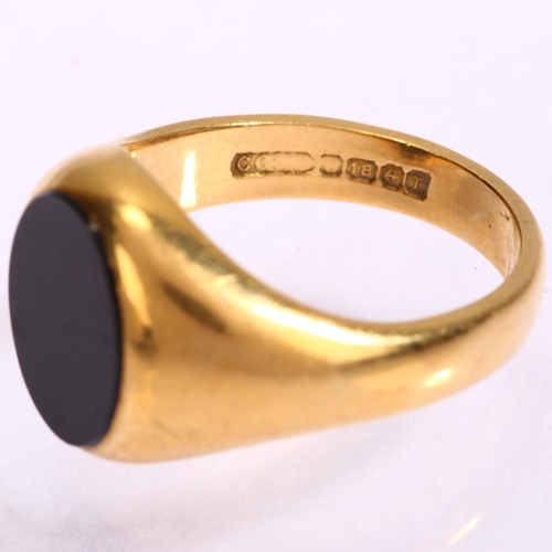 1136 - A mid-20th century 18ct gold black onyx signet ring, indistinct maker's mark, Birmingham 1968, setti... 