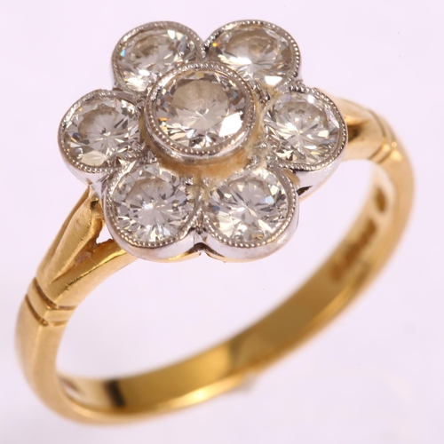 1139 - An 18ct gold seven stone diamond flowerhead cluster ring, set with modern round brilliant-cut diamon... 