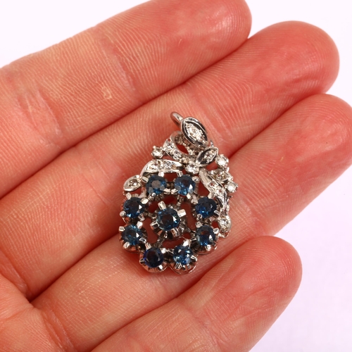 1146 - A late 20th century sapphire and diamond target cluster pendant, unmarked white metal settings test ... 