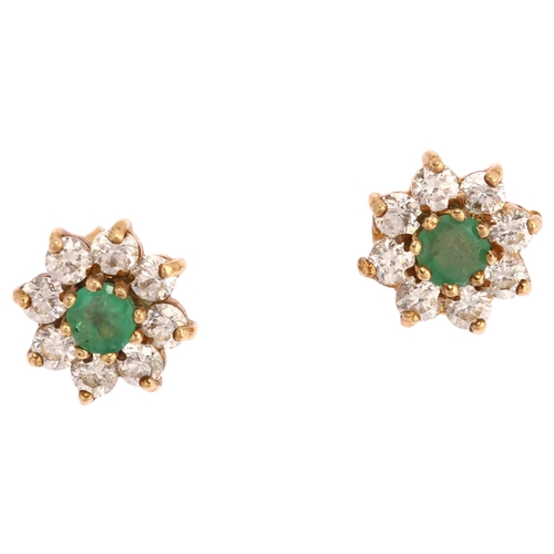 1157 - A pair of emerald and diamond flowerhead cluster earrings, unmarked gold settings with stud fittings... 