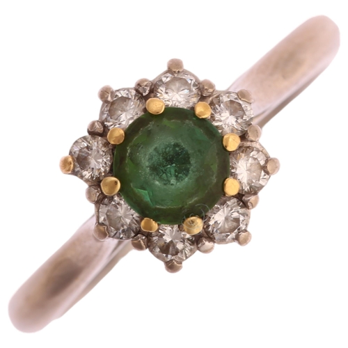 1158 - An 18ct gold emerald and diamond flowerhead cluster ring, setting height 9.4mm, size N, 4.2g