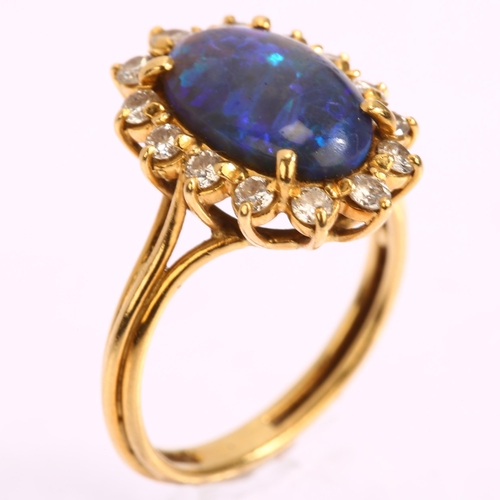 1161 - A modern 18ct gold black opal and diamond oval cluster ring, set with oval cabochon opal and modern ... 