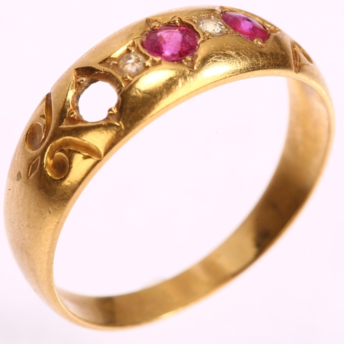 1167 - An early 20th century 18ct gold five stone ruby and diamond band ring, setting height 6.6mm, size P,... 