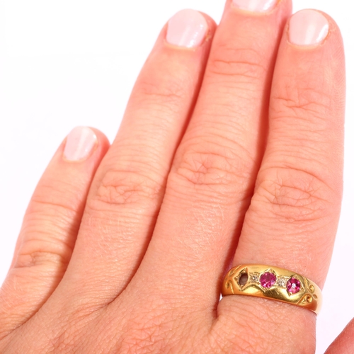 1167 - An early 20th century 18ct gold five stone ruby and diamond band ring, setting height 6.6mm, size P,... 