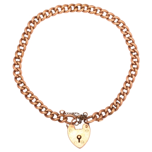 1179 - An early 20th century 9ct rose gold curb link chain bracelet, with 9ct heart padlock clasp, engraved... 