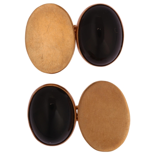 1182 - A pair of mid-20th century 9ct gold black onyx cufflinks, maker C&F, Birmingham 1967, panel length 1... 