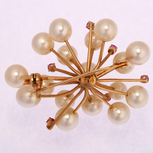 1191 - A mid-20th century 14ct gold ruby and cultured pearl abstract brooch, length 36mm, 7.4g