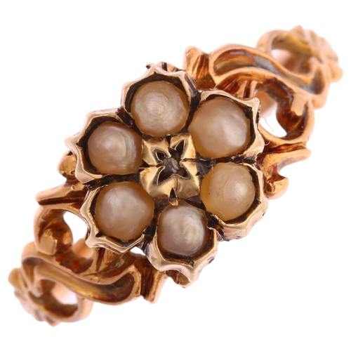 1192 - A 19th century diamond and split pearl mourning ring, unmarked gold settings with central flowerhead... 