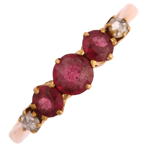 1198 - A graduated five stone ruby and diamond half hoop ring, unmarked gold settings with round-cut rubies... 