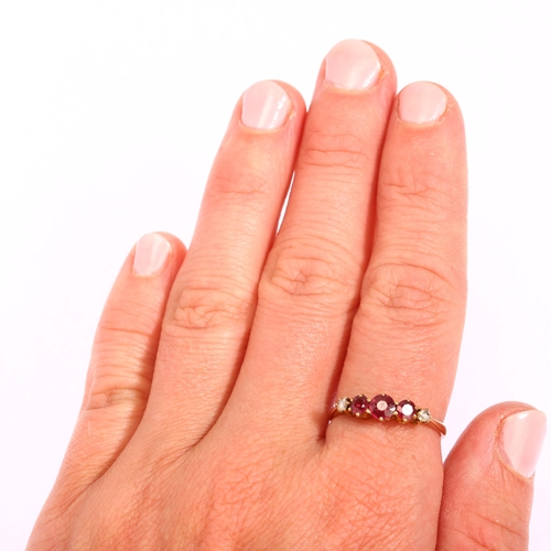 1198 - A graduated five stone ruby and diamond half hoop ring, unmarked gold settings with round-cut rubies... 