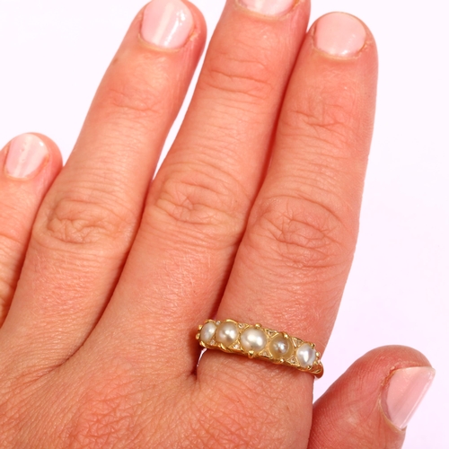 1199 - An early 20th century 18ct gold graduated five stone split pearl half hoop ring, with rose-cut diamo... 